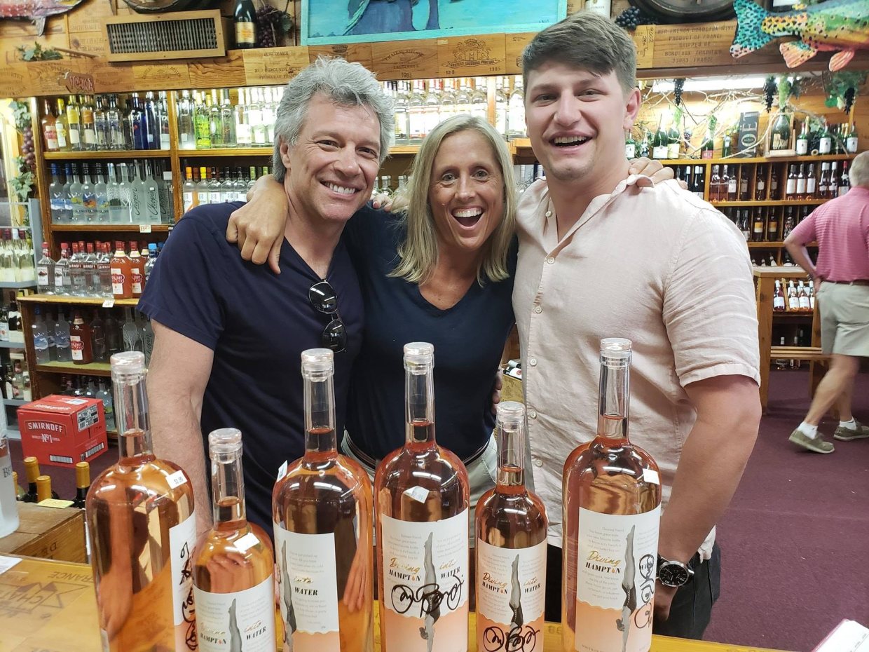 Michelle Reilly with guests at the store